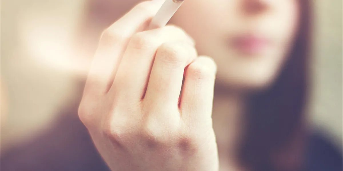 woman hands holding cigarette outdoor woman hands holding cigarette outdoor