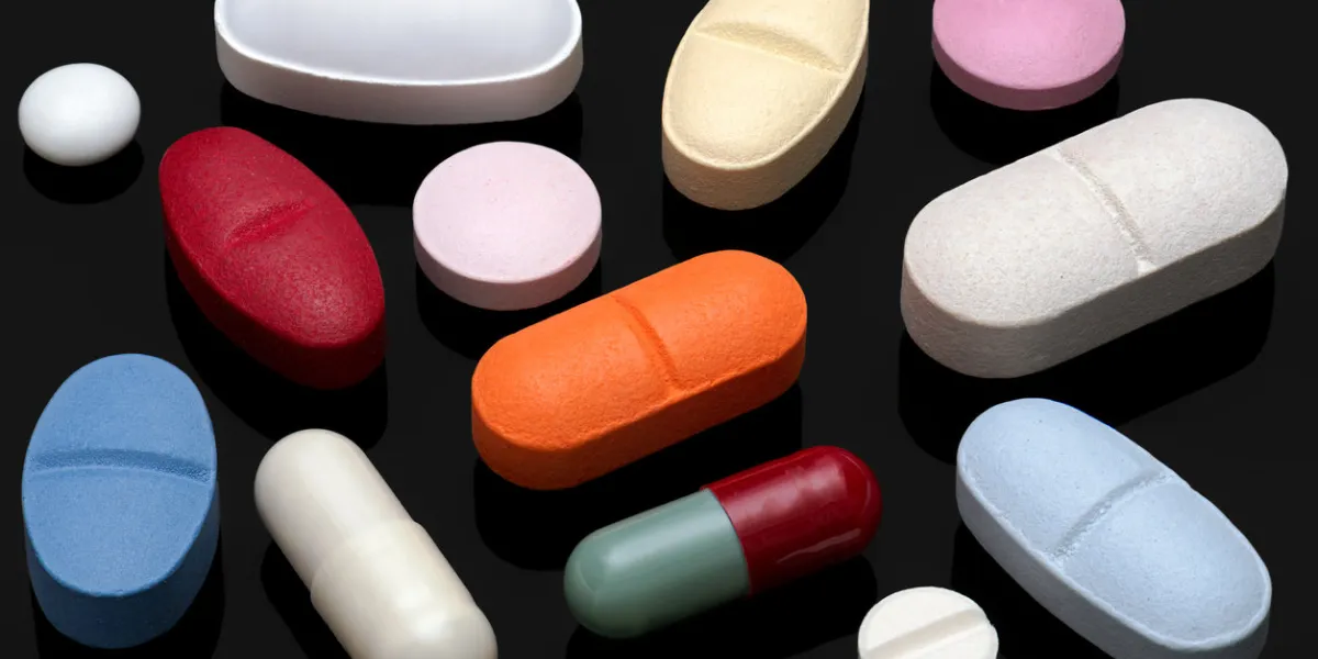 pills and capsules of different colours and sizes, completely focused pills and capsules of different colours and sizes, completely focused