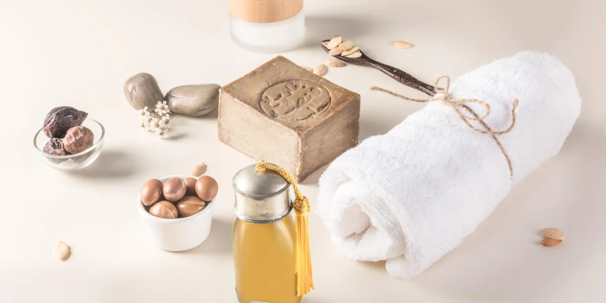 composition of argan fruits, seeds, oil, cream and soap fot skin care