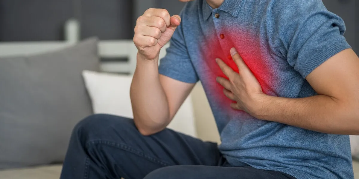 sore throat and cough, man with lung pain at home, health problems concept sore throat and cough, man with lung pain at home, health problems concept