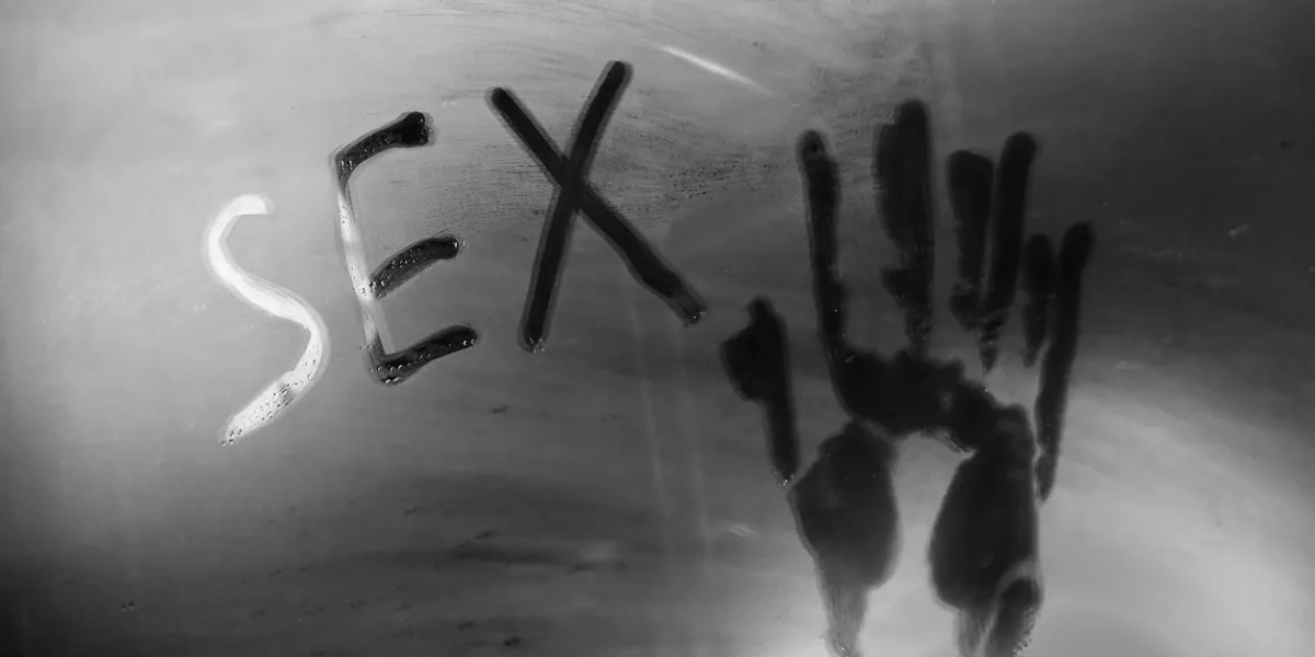 concept photo of sex in the bathroom inscription sex on the mirror