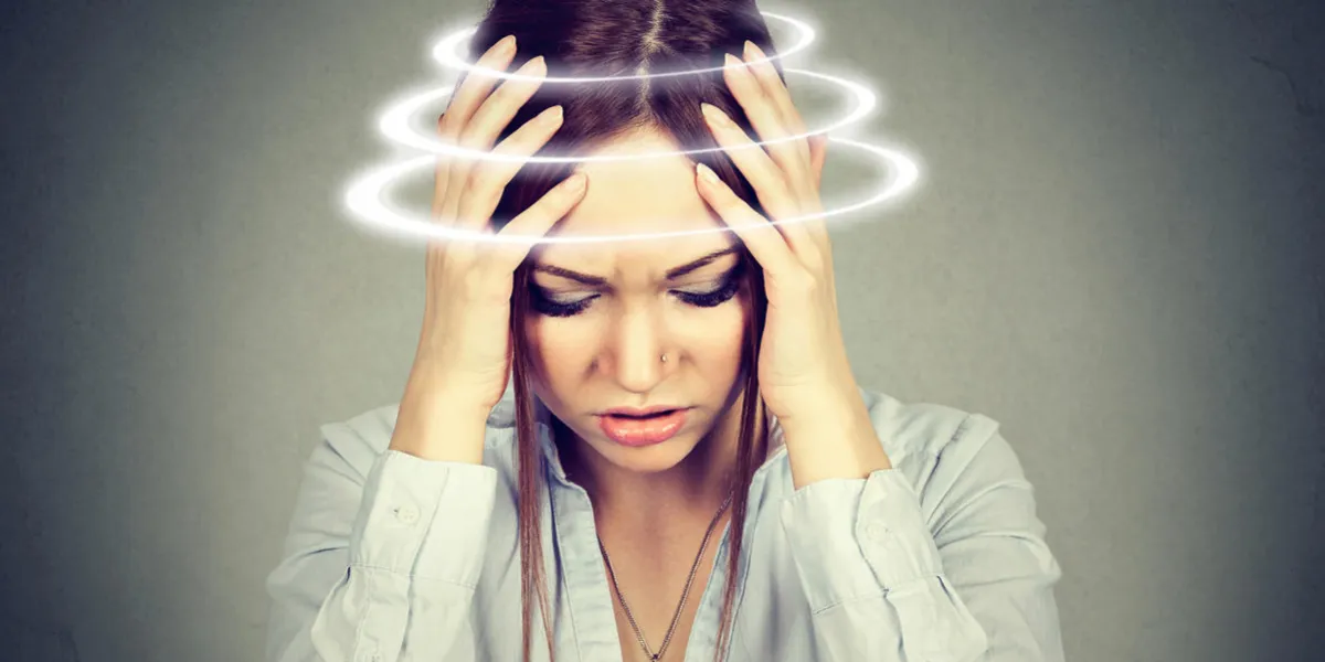 woman with vertigo young female patient suffering from dizziness woman with vertigo young female patient suffering from dizziness