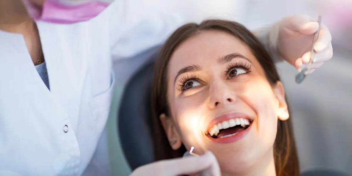 dentist and patient in dentist office dentist and patient in dentist office