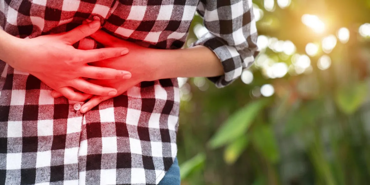 young woman having stomach pain young woman having stomach pain