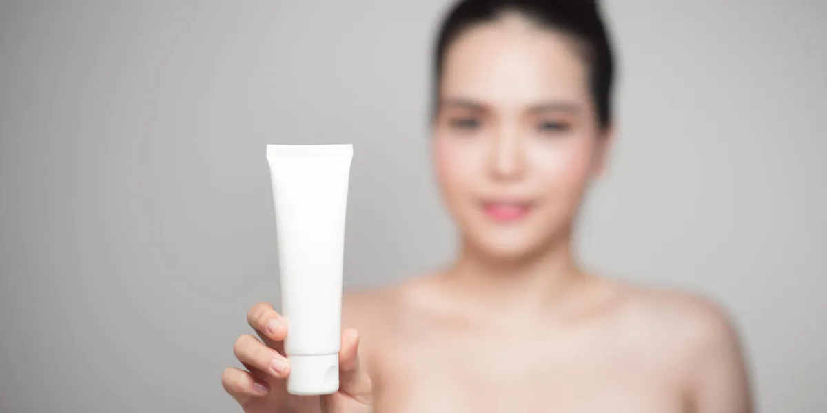 beauty concept asian pretty woman with perfect skin holding cosmetic bottle beauty concept asian pretty woman with perfect skin holding cosmetic bottle