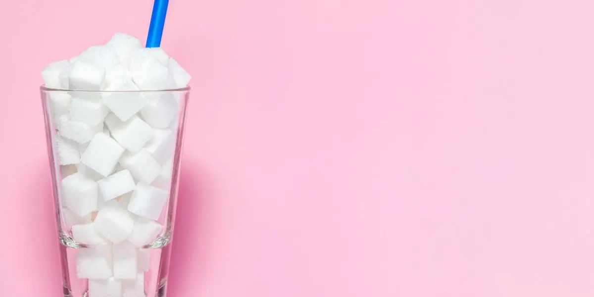 glass full of sugar cubes - unhealthy diet concept