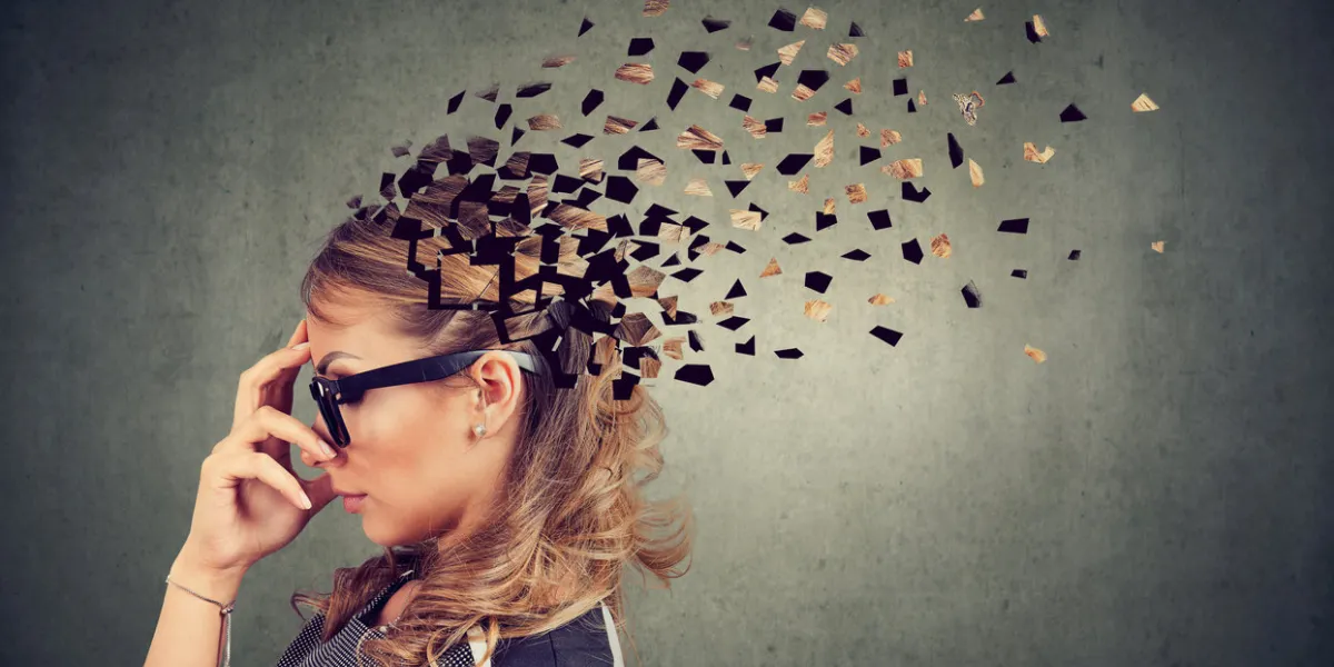 memory loss due to dementia or brain damage side profile of a woman losing parts of head as symbol of decreased mind function memory loss due to dementia or brain damage side profile of a woman losing parts of head as symbol of decreased mind function
