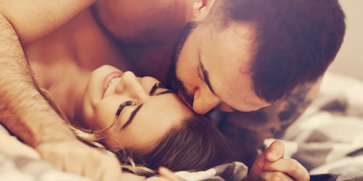 picture showing sexy young lovers being intimate in bed picture showing sexy young lovers being intimate in bed