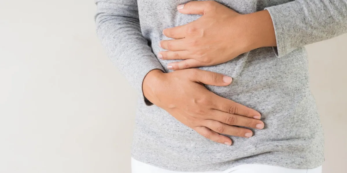 young woman having painful stomachache chronic gastritis abdomen bloating concept young woman having painful stomachache chronic gastritis abdomen bloating concept