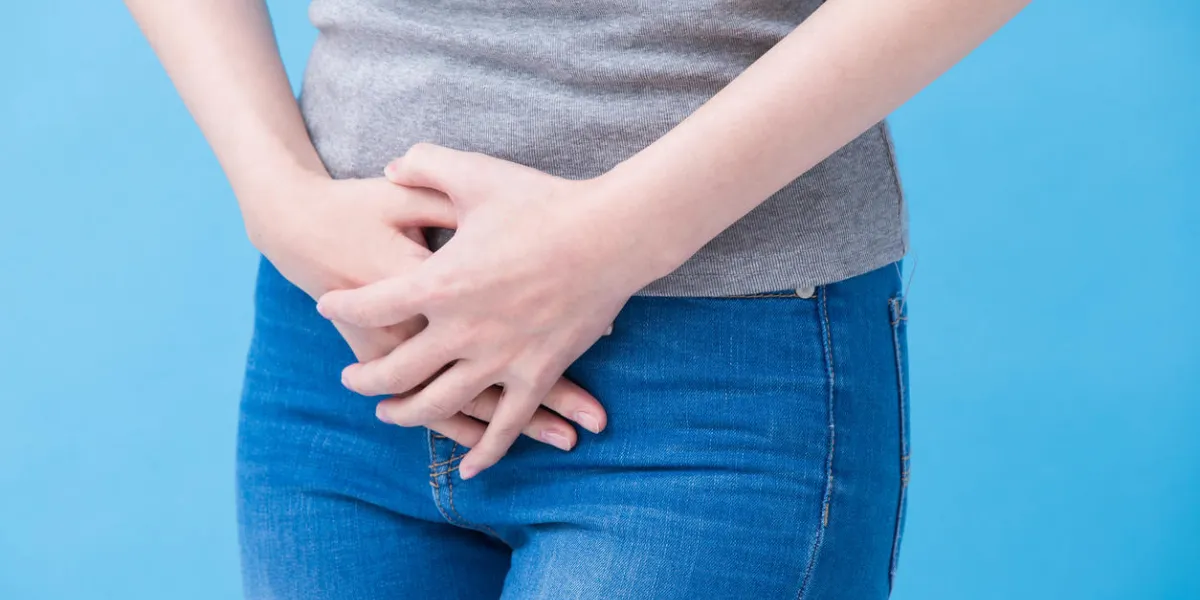 woman feel stomachache on the blue backgorund woman feel stomachache on the blue backgorund