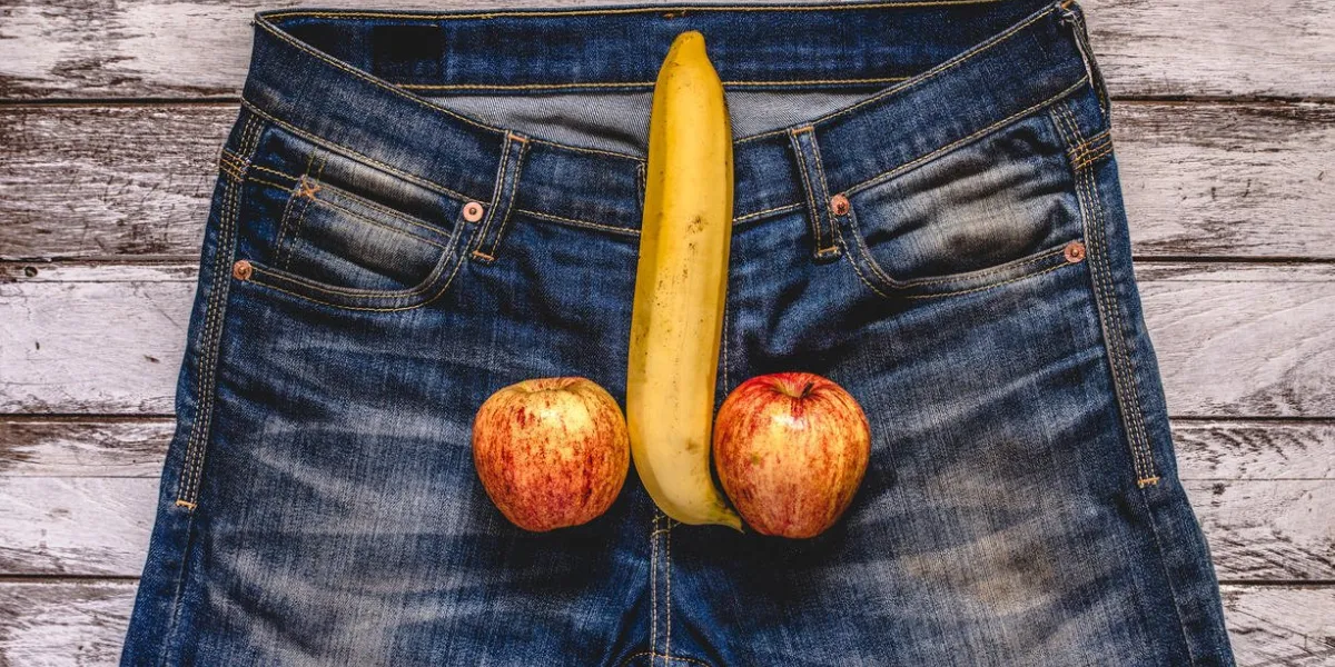 banana and apple out of mens jeans like mens penis potency concept banana and apple out of mens jeans like mens penis potency concept