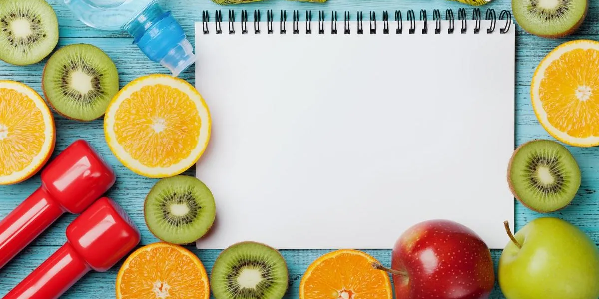 diet plan, menu or program, tape measure, water, dumbbells and diet food of fresh fruits on blue background, weight loss and detox concept, top view diet plan, menu or program, tape measure, water, dumbbells and diet food of fresh fruits on blue background, weight loss and detox concept, top view