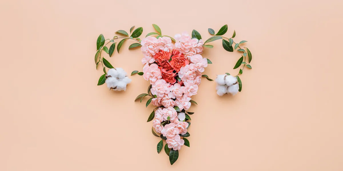 abstract image of the uterus female reproductive system made up of flowers and leaves uterus conceptual image
