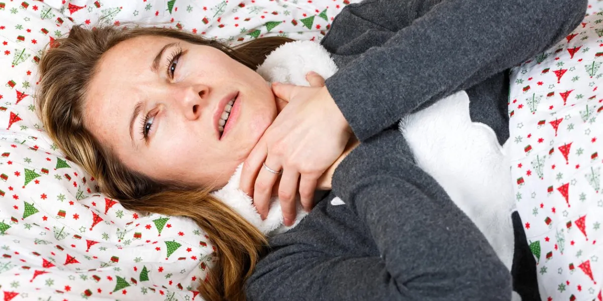 sick young woman sleeping in the bed