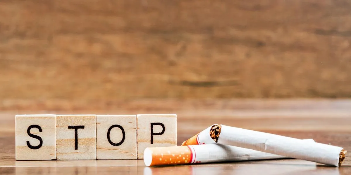 stop word and tobacco on wooden background world no tobacco day