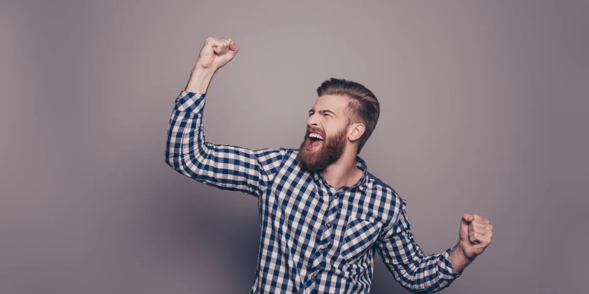 yes, he did it portrait of stylish happy bearded man raised hands and shouting yes, he did it portrait of stylish happy bearded man raised hands and shouting