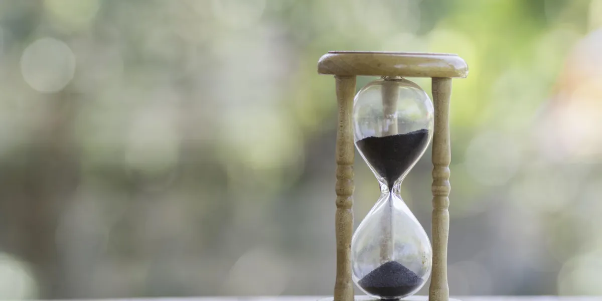 hourglass on blurred background hourglass on blurred background