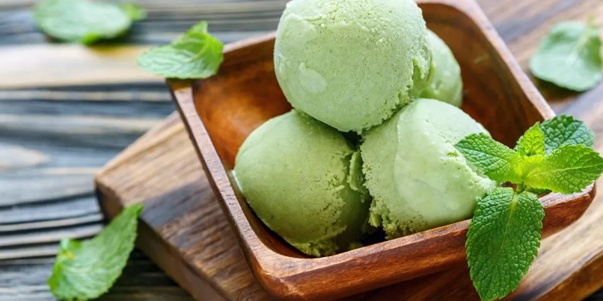 homemade mint ice cream in bowl on old table, selective focus homemade mint ice cream in bowl on old table, selective focus