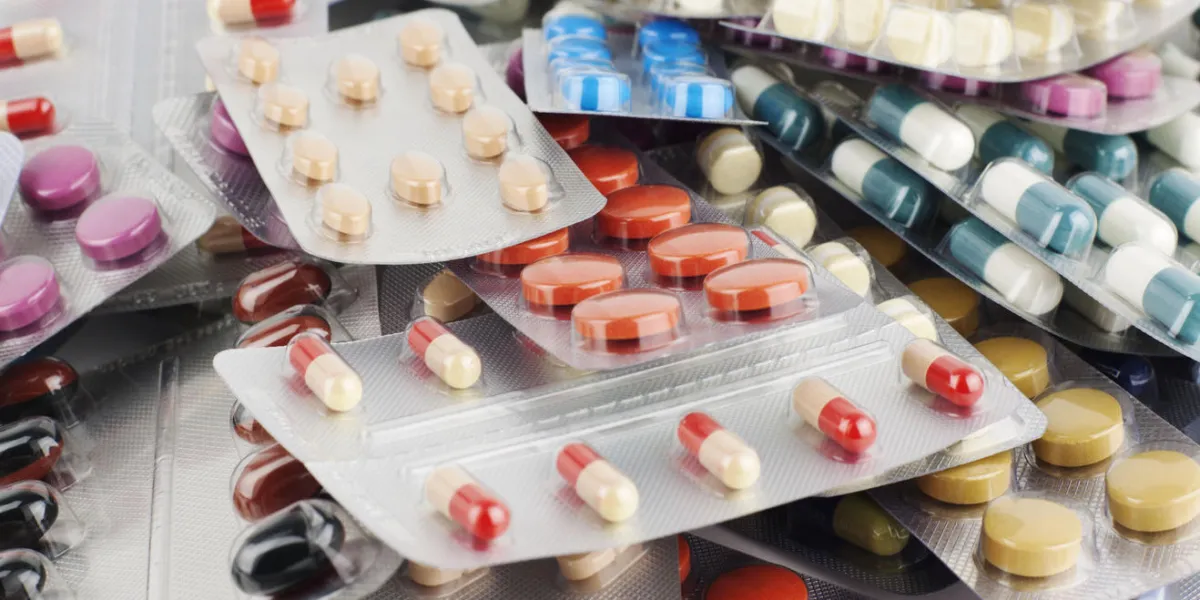 pile of different color pills