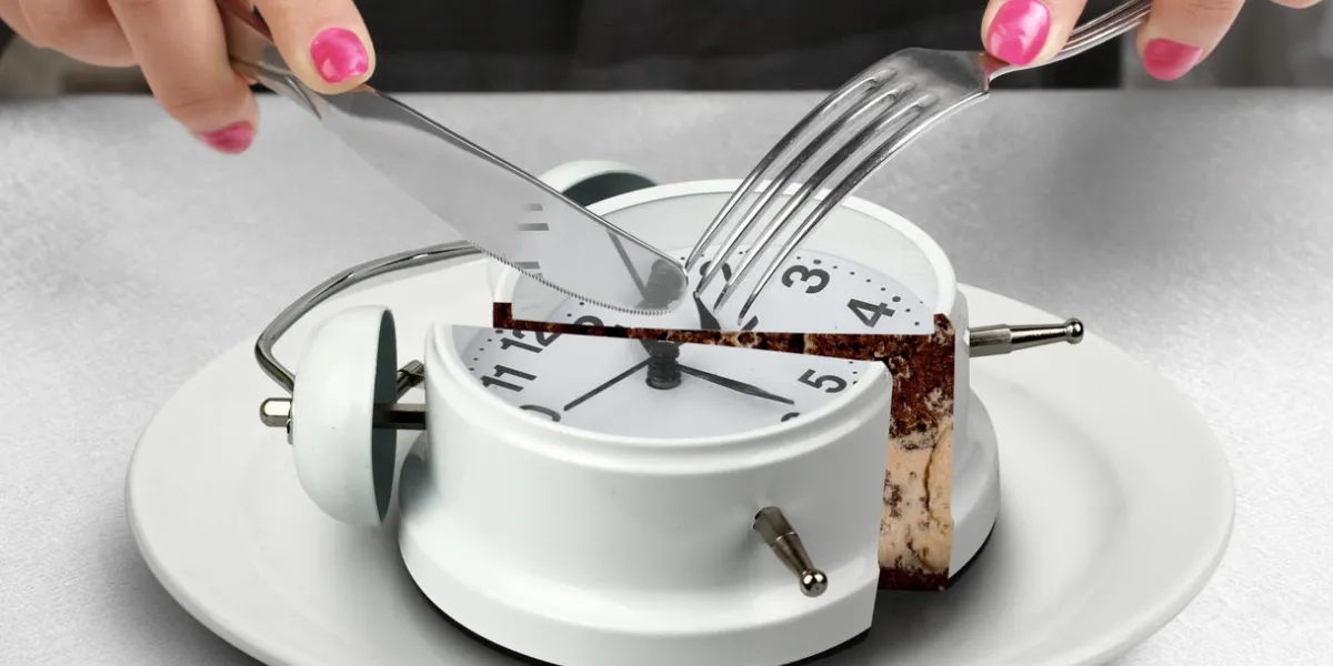 lunchtime concept, hand cut clock lunchtime concept, hand cut clock