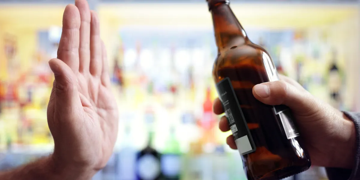 hand rejecting alcoholic beer beverage concept for alcoholism and addiction hand rejecting alcoholic beer beverage concept for alcoholism and addiction