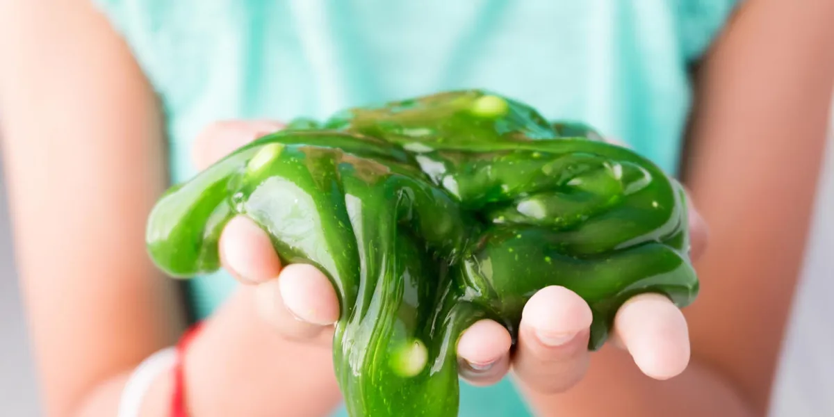 colorful of homemade toy called slime, kids having fun and being creative by science experiment