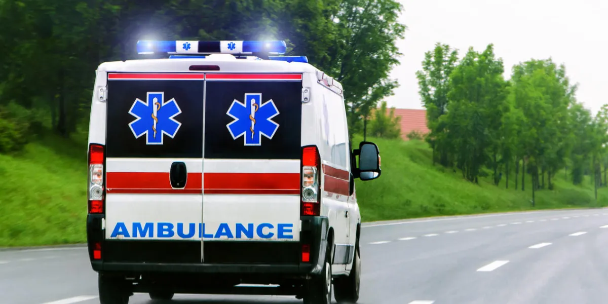 ambulance van with flashing lights blured motion