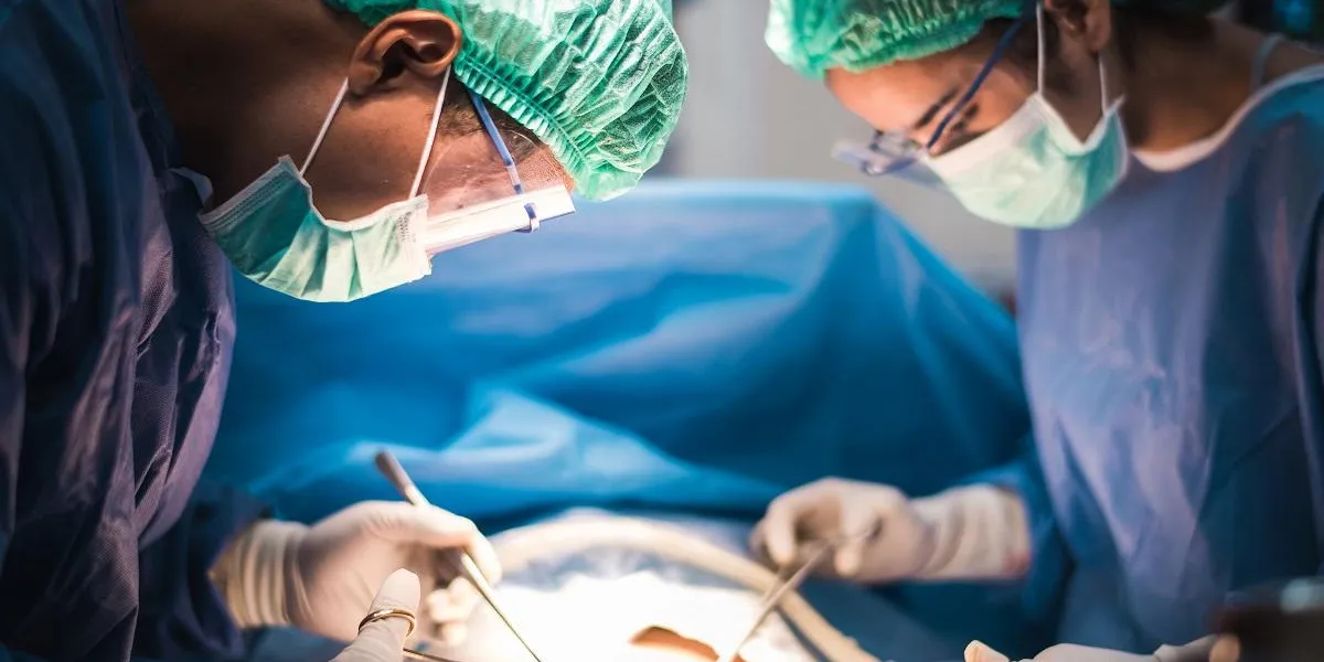 team of surgeons working in the operating room, medical concept