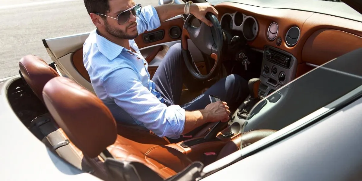 handsome man near the car luxury life