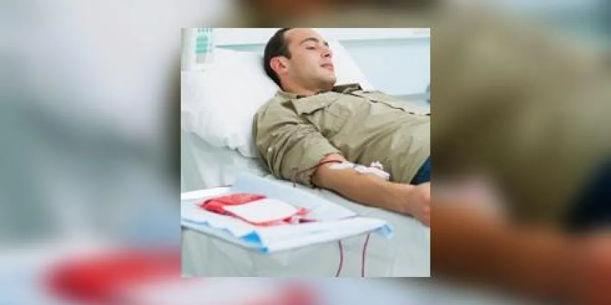 patient transfusé allongé sur un lit