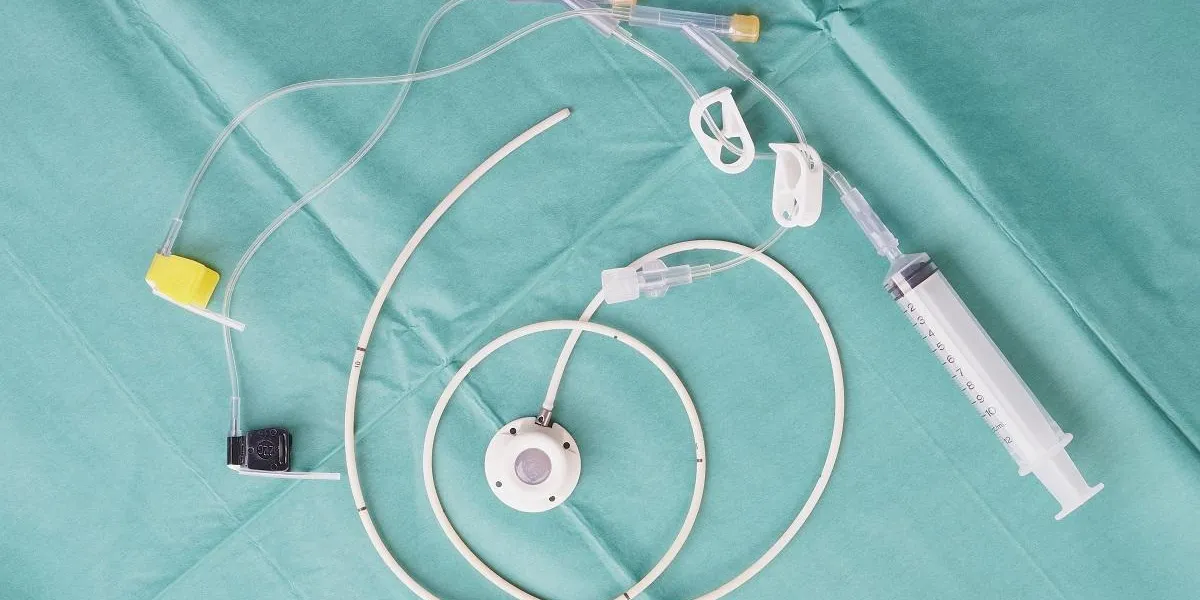 port a catheter or central venous port insertion, puncture at chest wall to aorta artery a medical device as silicone cartridges ,has flexible tube with syringe and needle