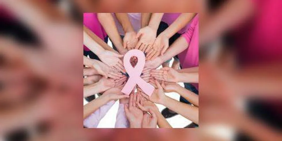 mains jointes en cercle tenant le symbole de lutte contre le cancer du sein mains jointes en cercle tenant le symbole de lutte contre le cancer du sein