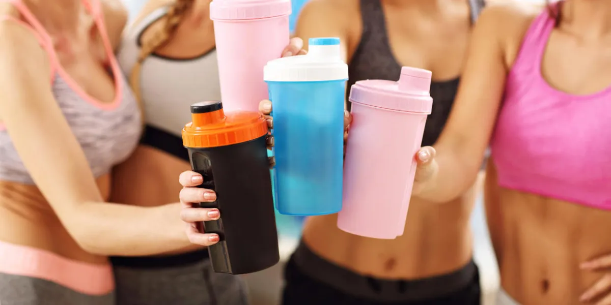 picture showing young women group resting at the gym after workout