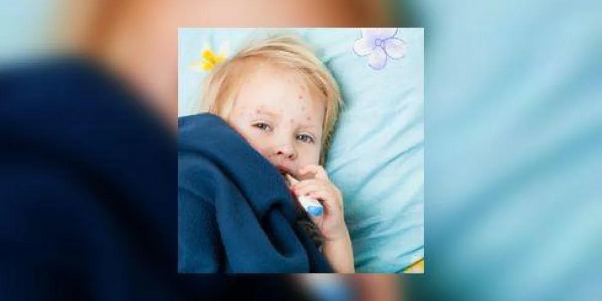 une fille malade mesure la température