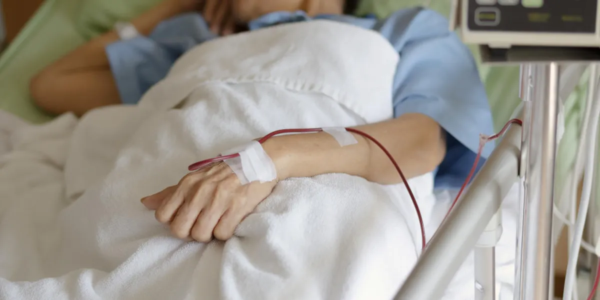 closeup patient's hand show blood transfusion in hostpital