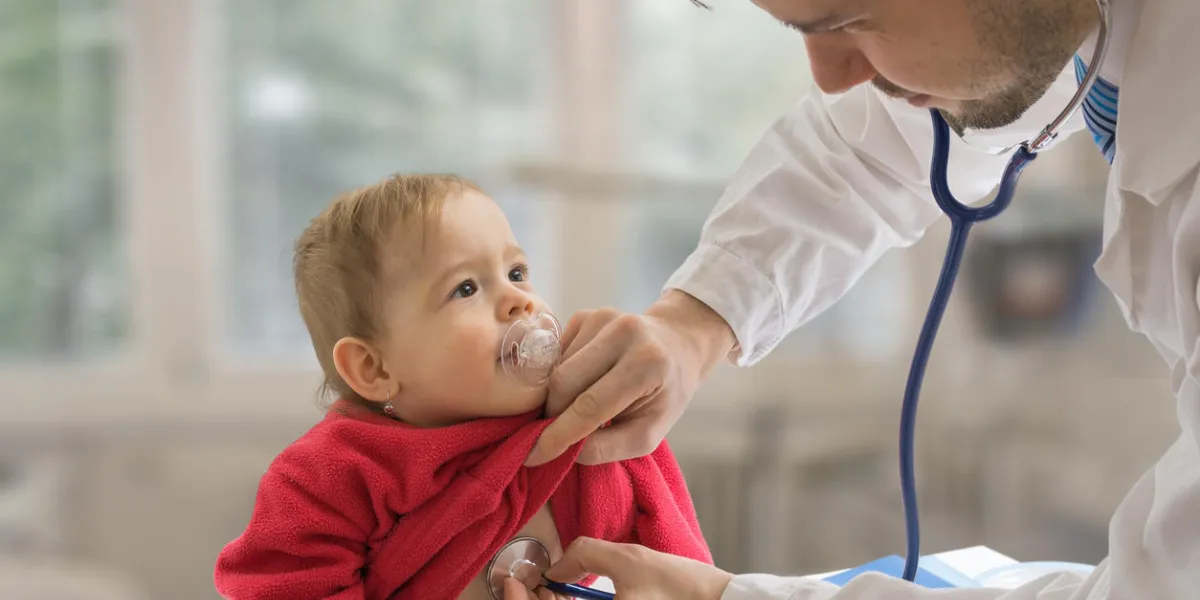pediatrician doctor is examining child with stethoscope pediatrician doctor is examining child with stethoscope