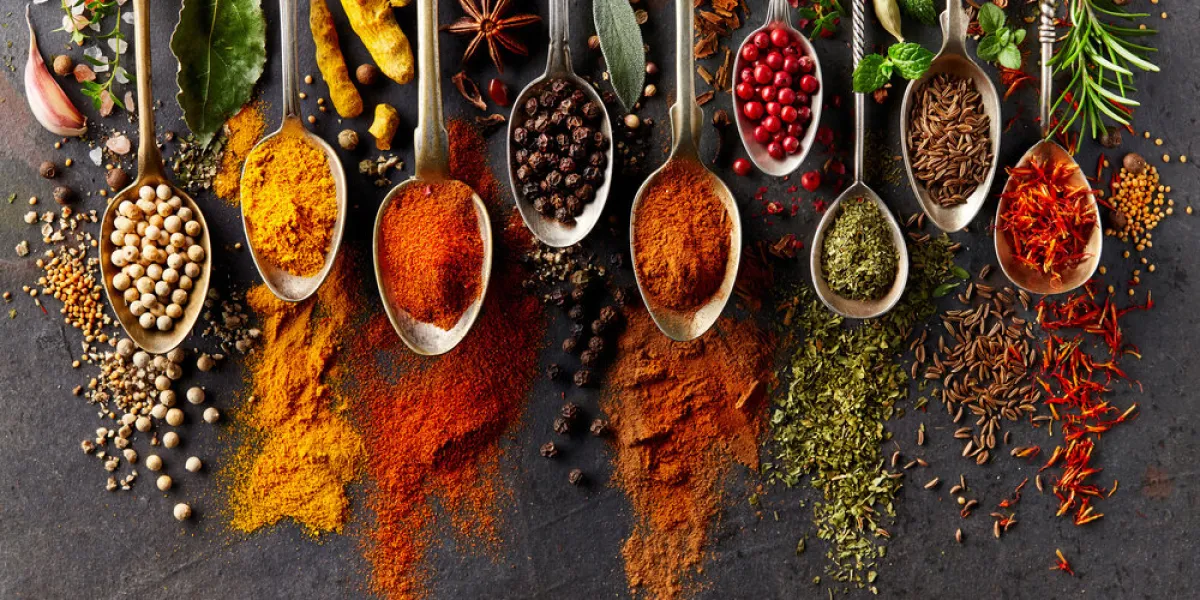 spices on black background spices on black background