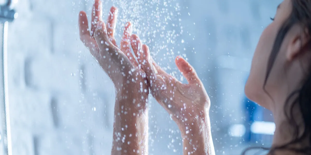 woman's hand shower woman's hand shower