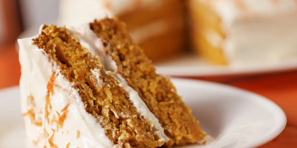 homemade carrot cake dessert on white platevery shallow depth of field homemade carrot cake dessert on white platevery shallow depth of field
