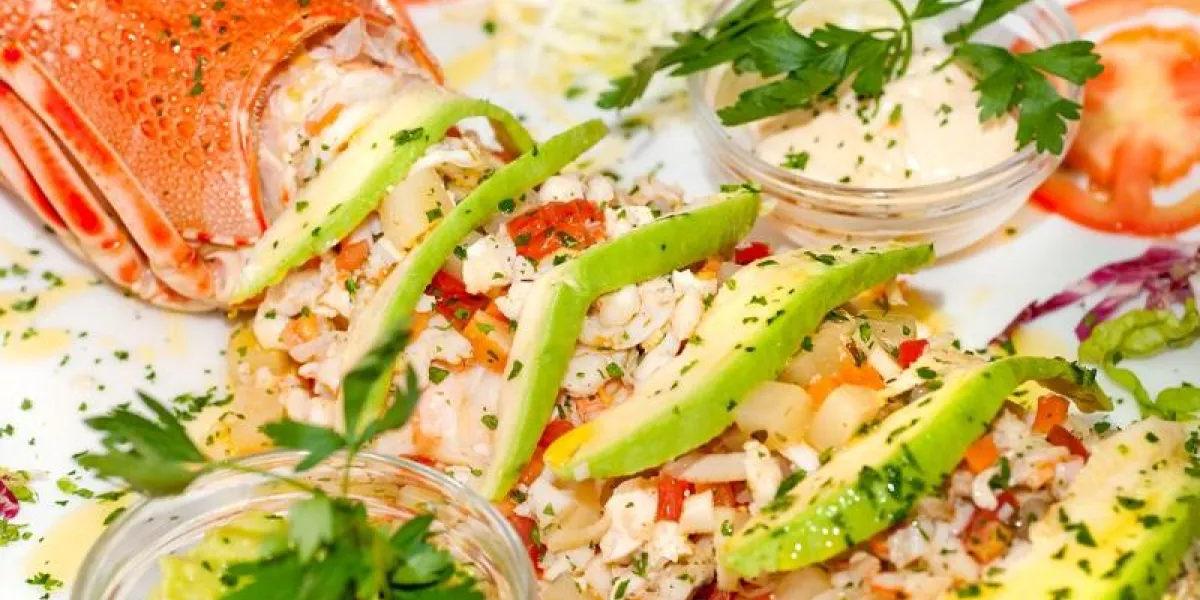 lobster salad, with tomato, avogado, potato and sauces